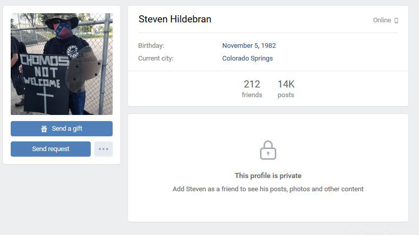 A screenshot of Steve Hildebran's VK profile, showing him wearing the same Nazi SS Totenkopf and "CHOMOS NOT WELCOME SIGN" along with a confederate flag mask