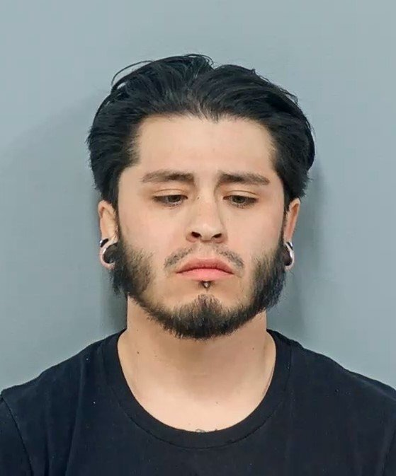 A mugshot of Antonio Balderas with the text "Antonio Balderas" on the bottom